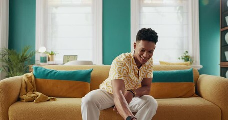 Poster - Happy man, phone and texting to relax on social media for rest or comfort on weekend in home on sofa. Chill, technology and male person with smile on couch for calm peace and online dating on app
