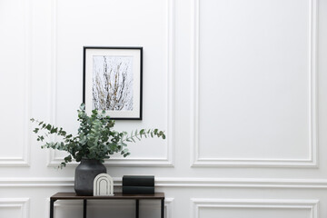 Aufkleber - Console table with decor near white wall in room, space for text. Interior design