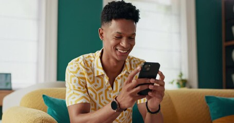 Poster - Happy man, mobile and texting to relax for online dating, rest or comfort on weekend in modern home. Phone, technology and male person with smile in living room for notification and social media app