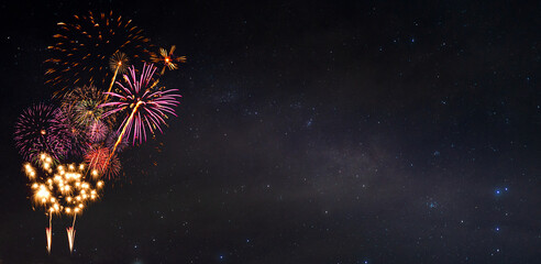 Wall Mural - fireworks with blur milky way background