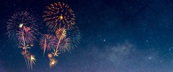 Wall Mural - fireworks with blur milky way background