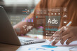 © IDOL'foto - Digital advertising and marketing analytics concept. professional analyzes ad performance dashboard, showcasing customer engagement insights, social media strategy, audience targeting, ROI measurement