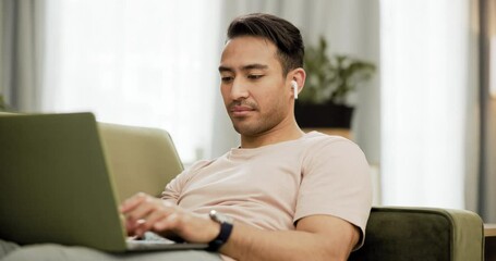 Poster - Man, laptop and typing or music on sofa as freelance work for online communication, project or planning. Asian person, cellphone or audio listening on couch in home internet, social media chat as job
