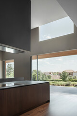 Wall Mural - Modern kitchen design featuring large windows with a view of the outdoors and minimalistic decor