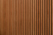 © RTMC - Advertising template, tropical hardwood acoustic panel. Cherry red. Angled closeup shot