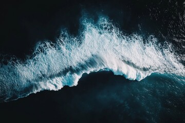 Wall Mural - aerial view of powerful ocean waves crashing against dark water