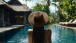 © Niklas - young woman relaxing in a pool