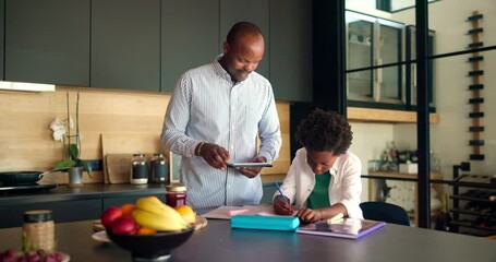 Poster - Happy dad, child and teaching with tablet for homework, school project or assignment in kitchen at home. Father, kid or helping son with technology for tutoring, homeschooling or distance learning