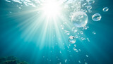 sun rays and air bubbles under water