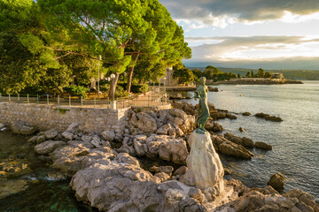 Wall Mural - Maiden with the Seagull and seaside of Croatian town Opatija