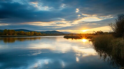 Aufkleber - Tranquil river reflecting the sunset with golden hues illuminating the serene natural landscape : Generative AI