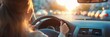© BZXO - A self-assured woman focuses on the road while driving in a bustling city.