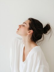 Poster - Profile portrait of a serene young woman with natural beauty resting against a plain background : Generative AI
