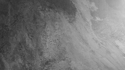 Fototapete - A grey wall with a few cracks and a few spots. The wall is made of stone and has a rough texture