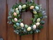 © Oleg - An artfully arranged wreath of greenery with colorful eggs, a cheerful and festive decoration for the Easter holiday.