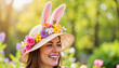 © Dmitrii Suslov - Joyful woman wearing colorful Easter bonnet at garden party, celebration