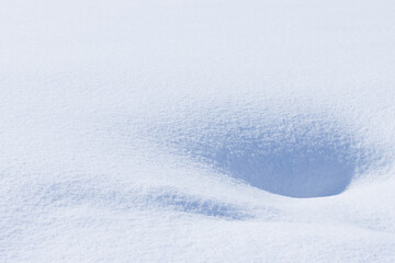 Wall Mural - fresh white winter snow surface with light and shadow