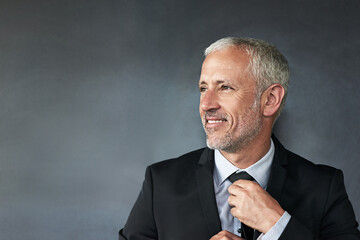 Poster - Thinking, space or mature businessman in studio for vision, daydreaming of ideas on white background. Smile, happy boss and proud CEO with mindset mockup for solution, problem solving and confidence