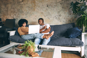 Poster - Relax, home and couple on sofa with laptop for online shopping, internet and digital subscription. Happy, coffee and African man and woman on computer for website, connection and chill on weekend