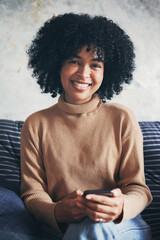 Poster - Home, sofa and woman in portrait with smartphone, connection and online communication with contact. House, African female person and smile with mobile for application, message or chat on social media
