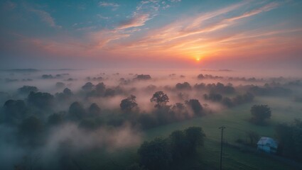 Wall Mural - misty sunset sky filled with color. abstract nature backdrop featuring sky texture. aerial view of a