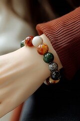 Poster - Trendy Woman Wearing a Colorful Gemstone Bracelet on Her Wrist in a Soft Light Environment : Generative AI