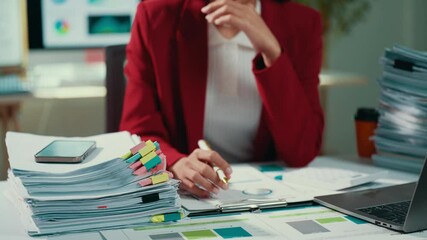 Aufkleber - professional businesswoman examining financial reports, analyzing sales data through charts and grap