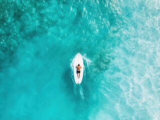 Poster - Aerial Ocean Adventure Solo Surfer Riding Turquoise Waves in Pristine Waters High-Energy Extreme Sports Visuals for Outdoor Lifestyle Marketing and Tourism Engagement