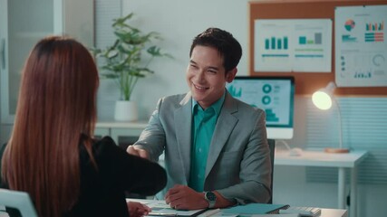 Poster - Professional Asian business leaders exchanging handshake, confirming collaborative partnership in corporate meeting setting