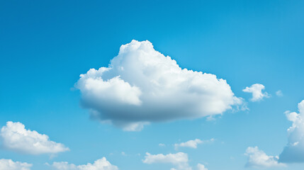 Poster - fluffy white cloud floats in serene blue sky, creating peaceful scene