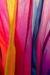 Aufkleber - Vibrant Multi-colored Textile Display with Bright Rainbow-Hued Fabric Drapes : Generative AI
