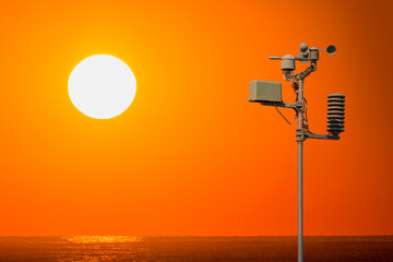 Wall Mural - weather station automatic measurement of weather parameters at sunset