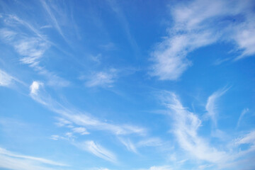 Wall Mural - beautiful blue sky with soft white clouds for abstract background