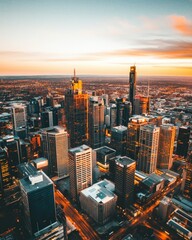 Poster - Stunning Aerial View of City Skyline at Sunset Golden Hour Urban Landscape Skyscrapers