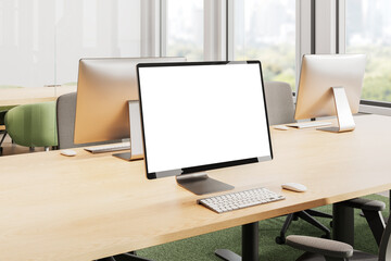 Poster - modern office interior with blank monitor screen on wooden desk. 3d rendering