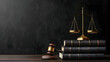 © rizkan - Legal symbols featuring a gavel and scales of justice on stacked law books in a dark setting