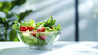 © nuttachet chinavong - Fresh salad with lettuce and tomatoes in glass bowl, vibrant colors