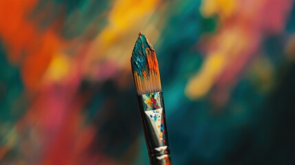 Poster - A painter's brush loaded with vibrant colors against an abstract canvas
