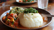 © Griffin9678 - Ugali with Beef Stew and Vegetables on Wooden Plate