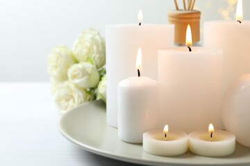 Wall Mural - Beautiful composition with candles on the table