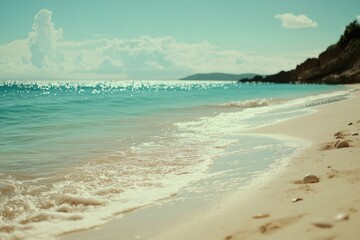 Wall Mural - a serene ocean view from a sandy beach, great for travel or nature-inspired designs