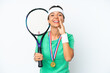© luismolinero - Young tennis player woman isolated on white background shouting with mouth wide open