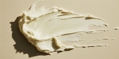 Poster - Close-up shot of cream on a table, suitable for food or product photography