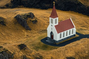 Wall Mural - A small white church with a distinctive red roof, surrounded by natural scenery