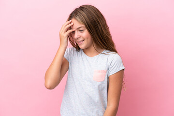 Wall Mural - Little caucasian girl isolated on pink background laughing