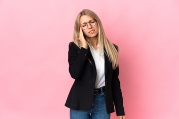 Poster - Business blonde woman isolated on pink background with headache