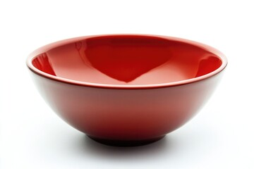 Poster - A small red bowl sits atop a white table, perfect for serving small portions or adding a pop of color to any setting