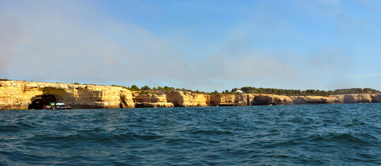 Wall Mural - The Algarve Rocks Formation is a unique and stunning natural wonder located in the coastal town of Porches Portugal