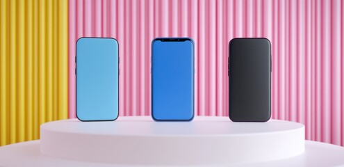 Poster - three smartphones in blue, black and light blue colors displayed on a white pedestal against a pink 