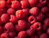 A close up of a bunch of red raspberries